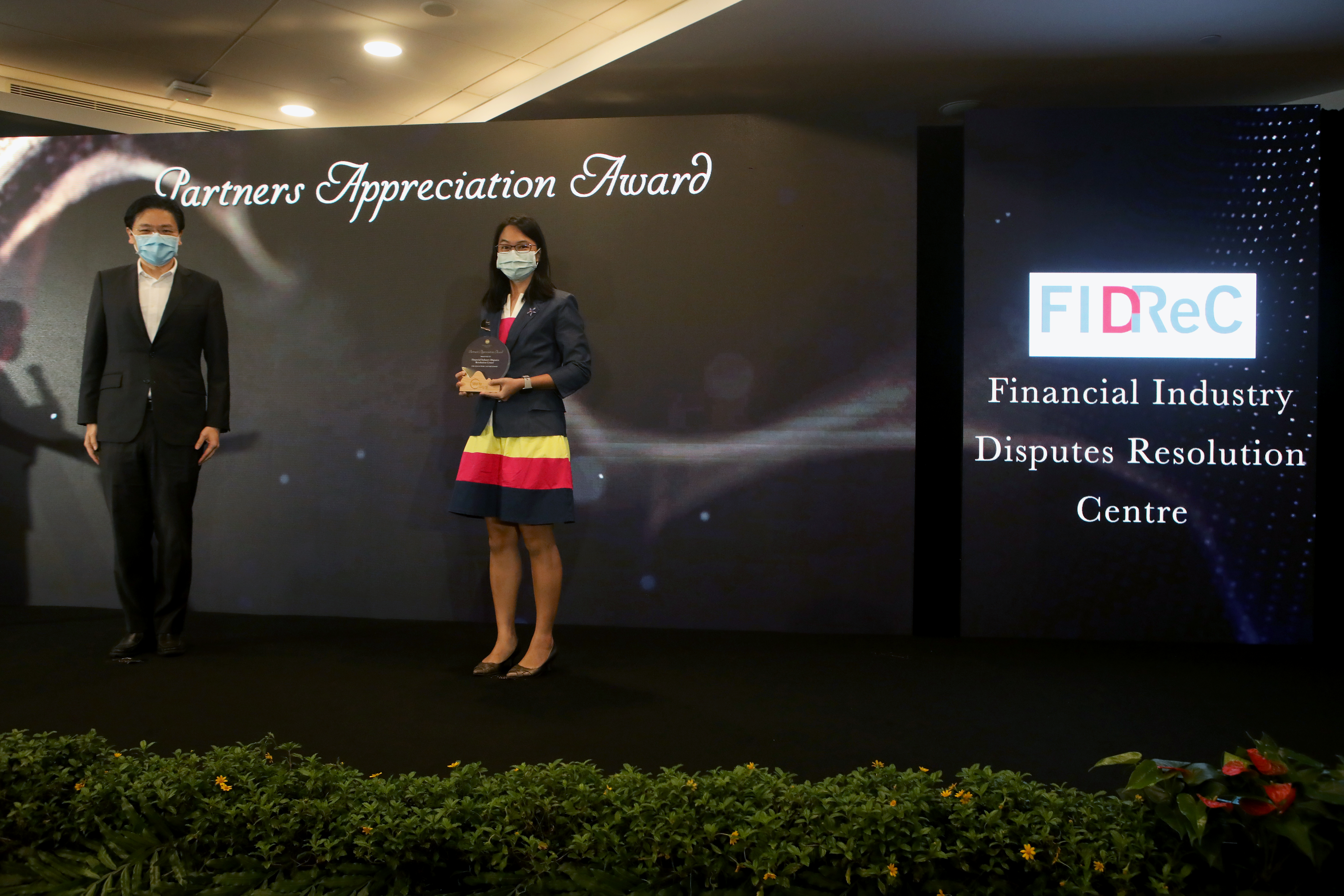 Mr Lawrence Wong Minister for Finance and Deputy Chairman MAS presenting the Partners Appreciation Award-2
